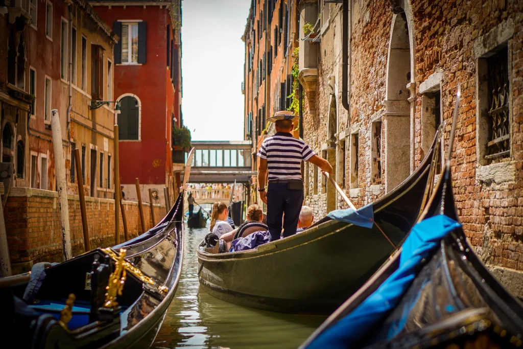 taking a gondola ride venice